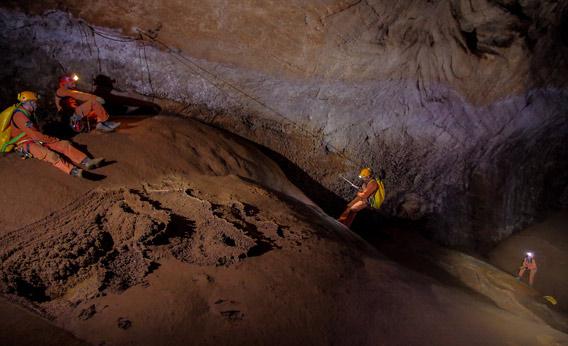 Astronauts descend into caves.